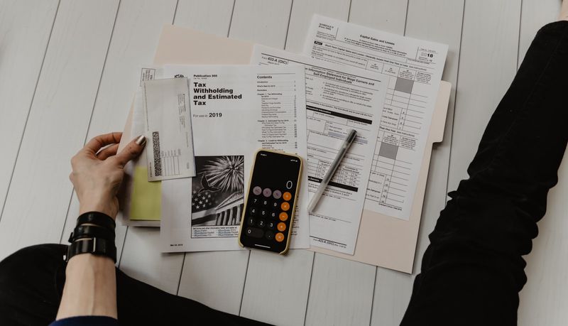 Catchup Bookkeepers financial professional reviewing organized business records